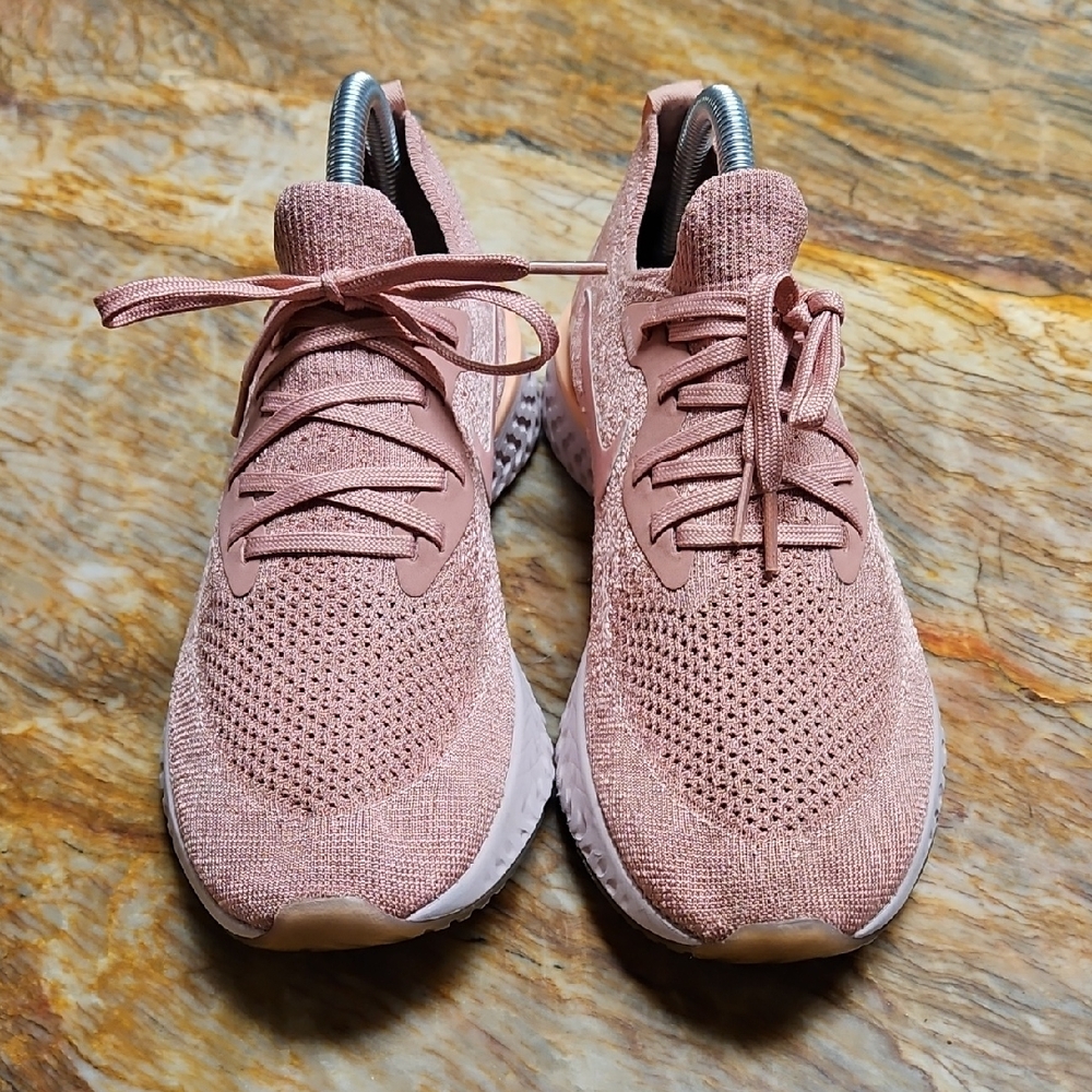 NIKE Epic React Flyknit women's running shoes in the Pink - 8.5